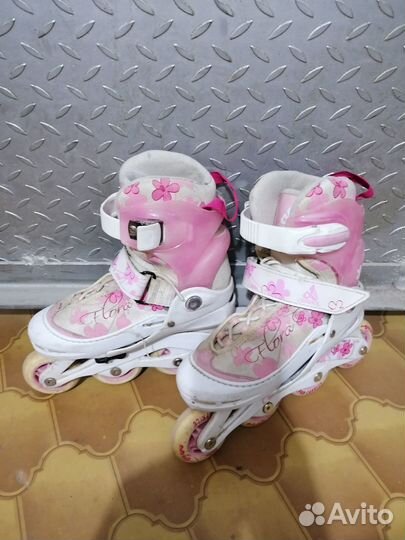 Роликовые коньки