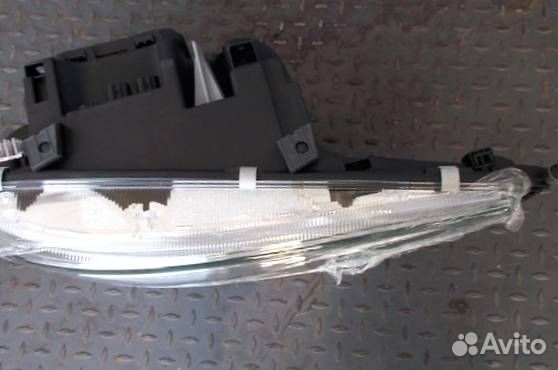 Фара левая MAN TGX TGS 4491102lmldem