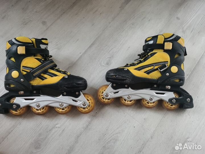 Роликовые коньки