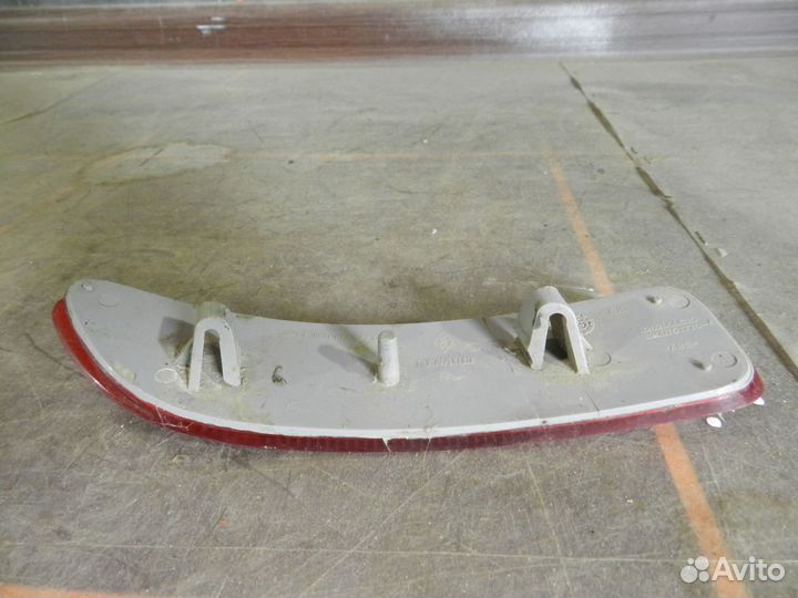 Отражатель бампера заднего левый- Renault Logan 1