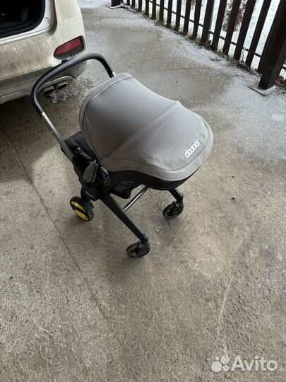 Детское автокресло коляска doona