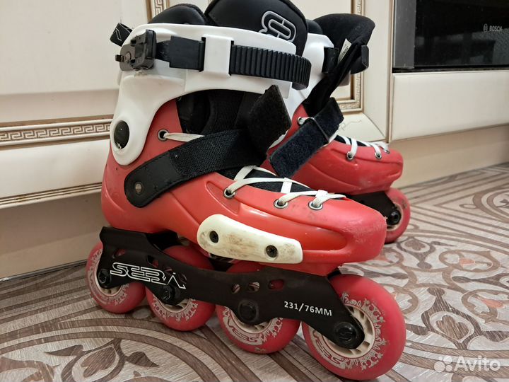 Роликовые коньки