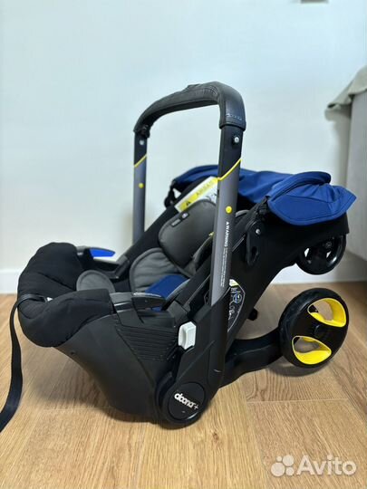 Коляска автокресло doona+ с базой isofix