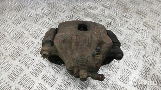 Суппорт тормозной передний левый KIA magentis MG