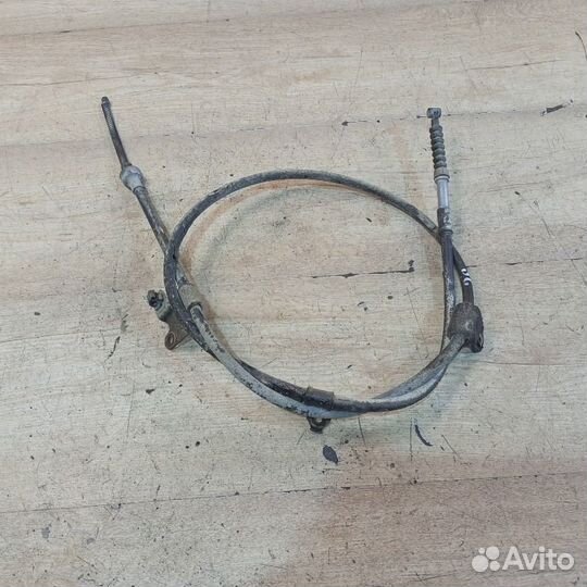 Трос ручника задний левый Toyota Corolla E12 1.6
