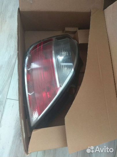 Фара Opel Astra H