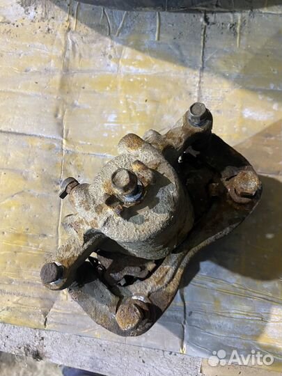 Суппорт тормозной передний Solaris