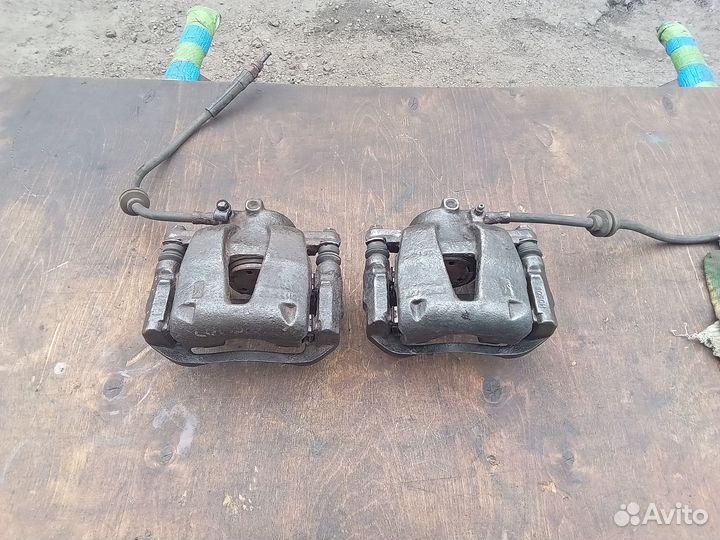 Суппорт тормозной передний Opel Corsa D