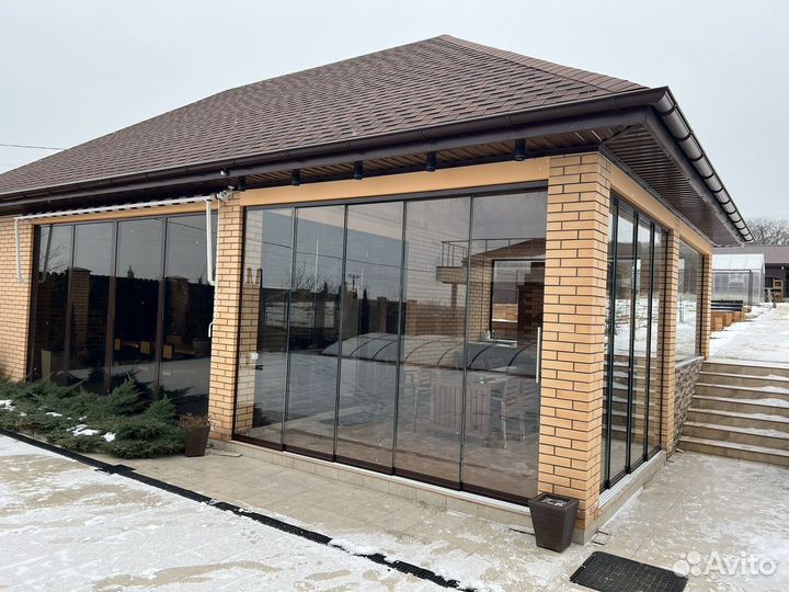 Безрамное панорамное остекление террасы