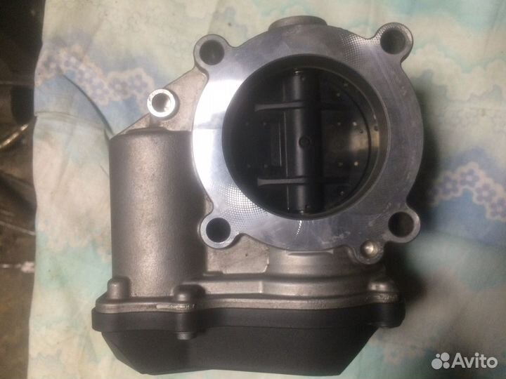 Дроссельная заслонка volkswagen 06F133062Q