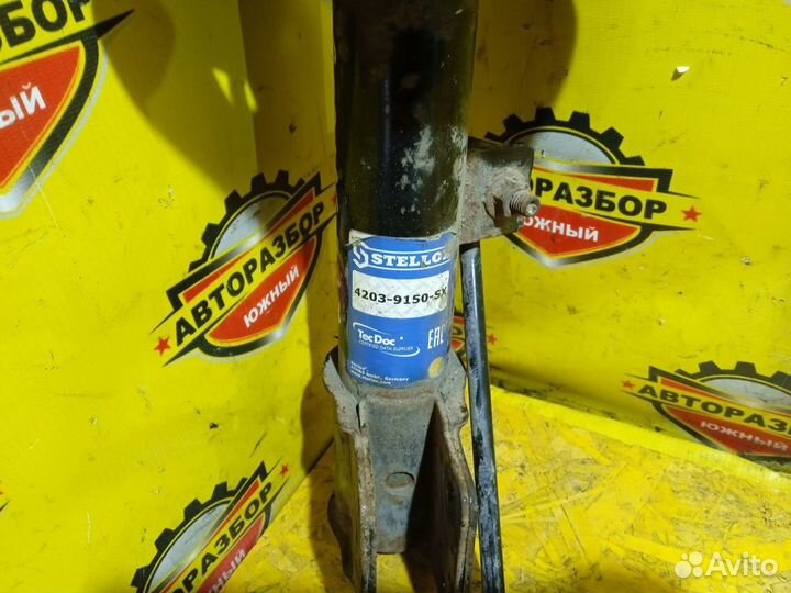 Амортизатор передний левый Peugeot 308