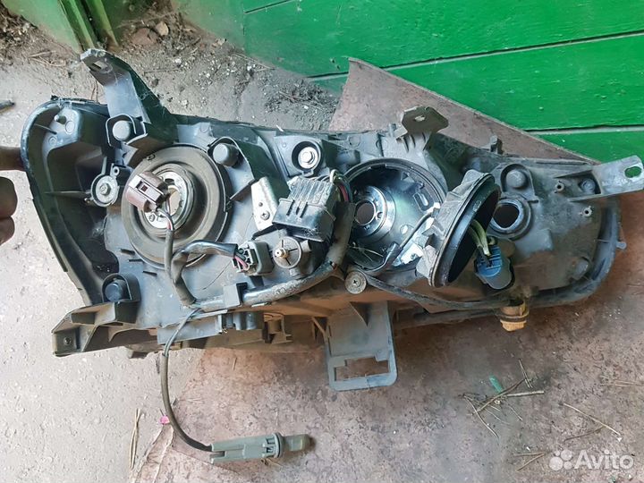 Фара левая lancer 10