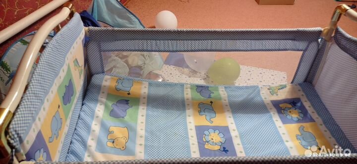 Детская кроватка с маятником