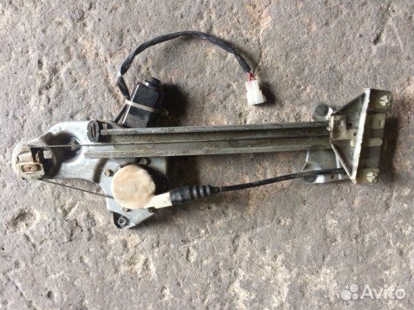 Стеклоподъемник электрический задний правый Mazda