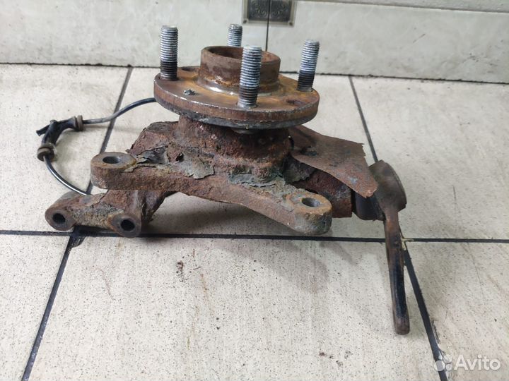 Поворотный кулак передний левый Chevrolet Авео Т25