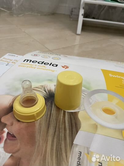 Молокоотсос medela swing maxi flex