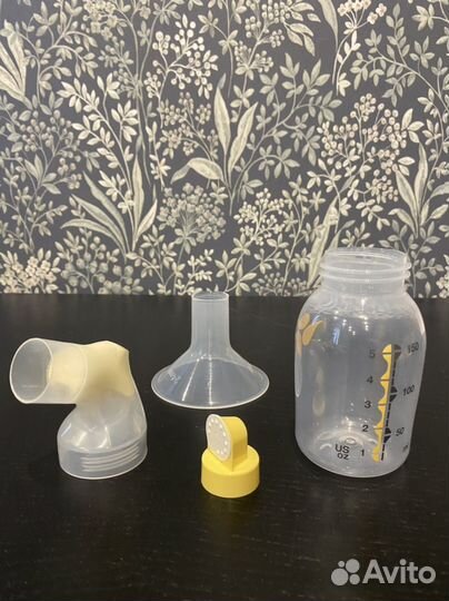 Молокоотсос medela