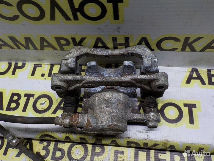 Суппорт задний левый Subaru Impreza III (GE/GH/GR