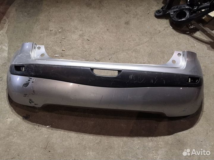 Бампер задний Ниссан Нота бу