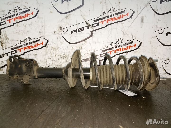 Стойка ходовки toyota raum NCZ20 NCZ25 передняя ле