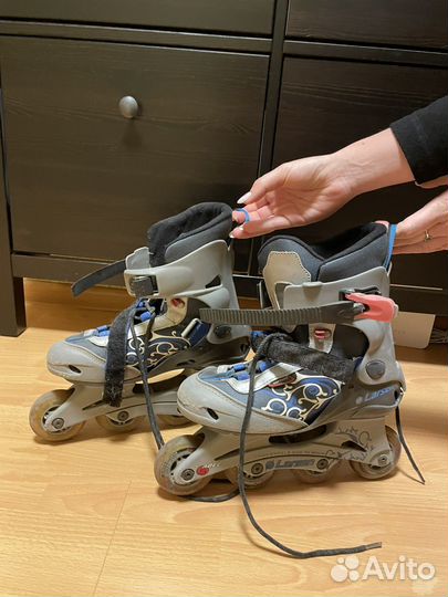 Роликовые коньки