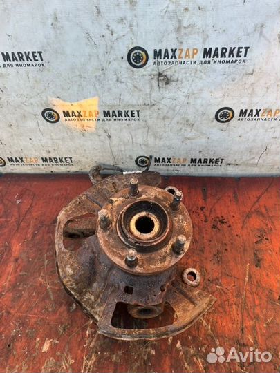 Кулак поворотный левый Mazda Bongo Friendee 1999