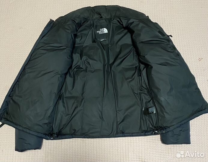 Пуховик the north face saikuru