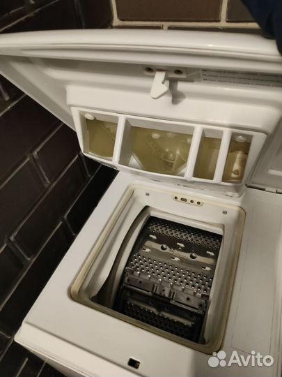 Стиральная машина автомат с вертикальной загрузкой