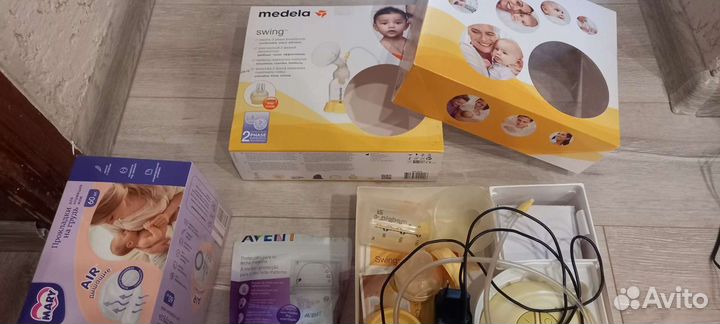 Молокоотсос medela электрический