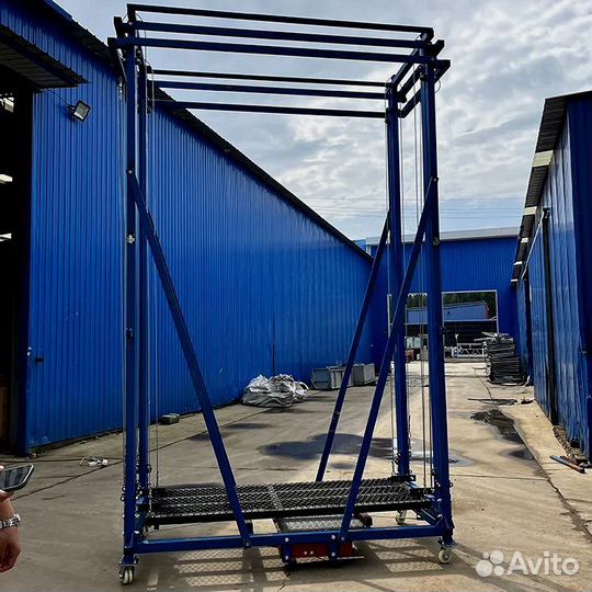 Строительные леса с электроподъемником