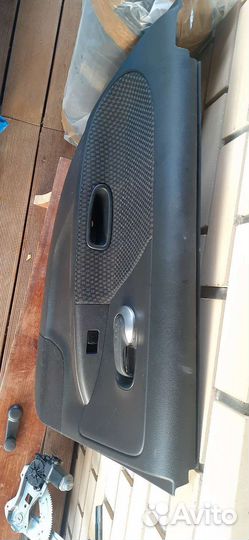 Обшивка (карта) двери Nissan note e11 зад.прав