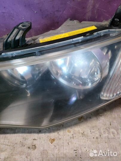 Фара ксеноновая передняя левая Mitsubishi