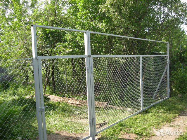 Секционные ворота и калитка