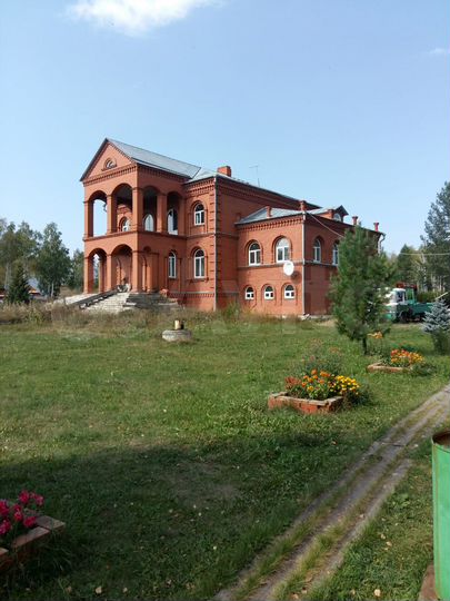 Коттедж 612 м² на участке 12 сот.