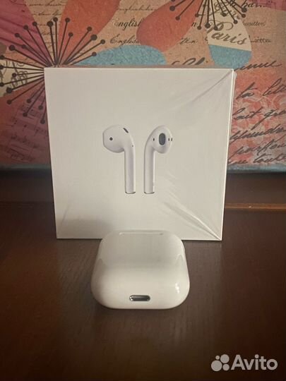 Apple AirPods (2nd Generation) with charging case