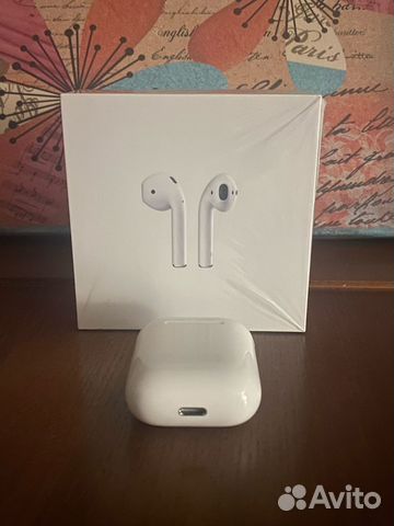 Apple AirPods (2nd Generation) with charging case