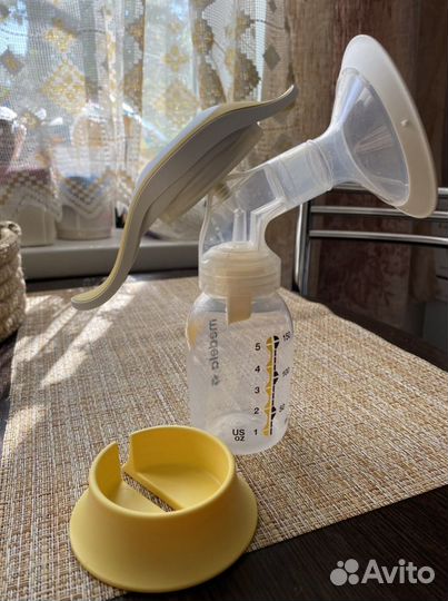 Молокоотсос medela