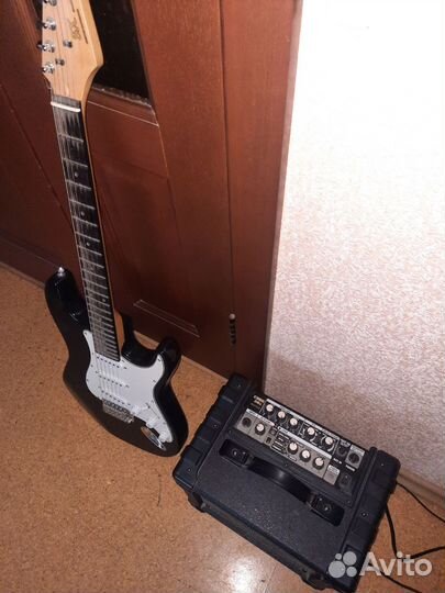 Электрогитара с комбоусилителем