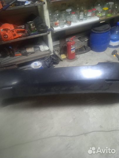 Бампер задний Toyota Corolla (2004-2006 год)