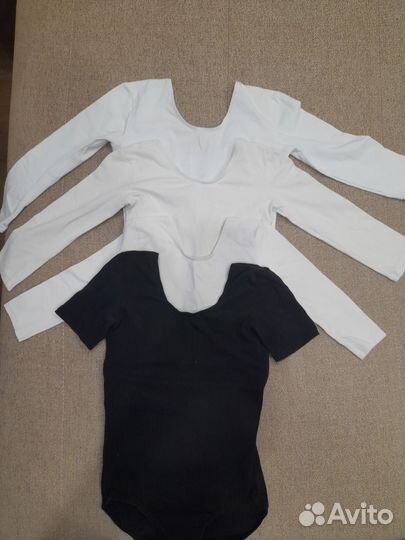 Гимнастический купальник и юбки