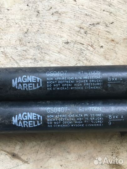 Амортизатор двери багажника Фокус Ford Focus 1