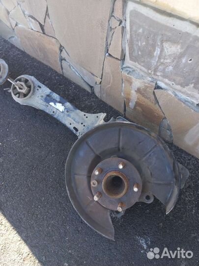 Кулак поворотный задний(левый) Форд Мондео 4