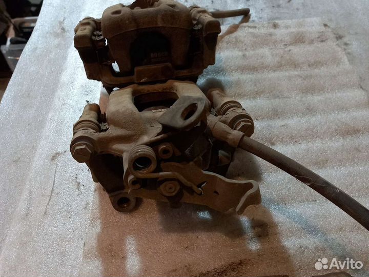 Суппорт задний VW Touran