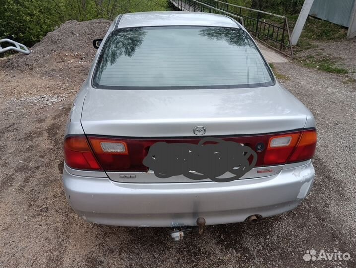 Двигатель на mazda 323