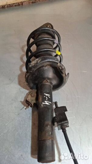 Стойка амортизатора передняя правая Mazda 3 BK