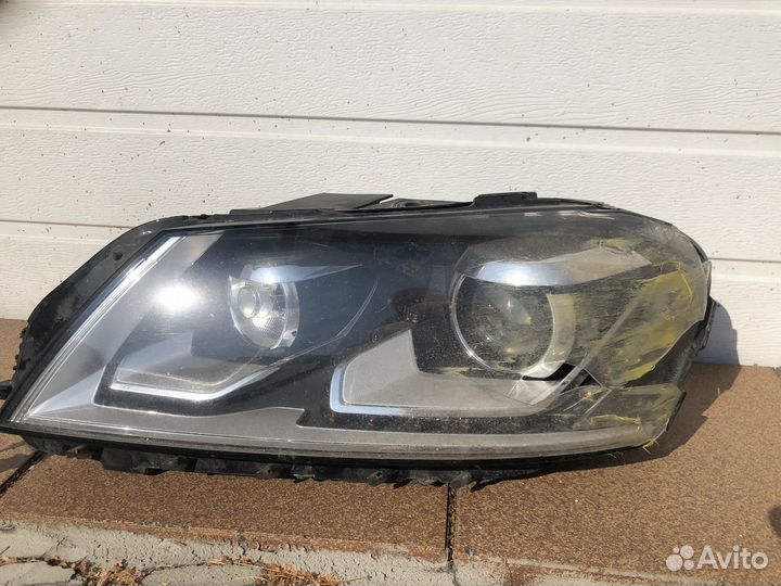 Фара левая volkswagen passat b7