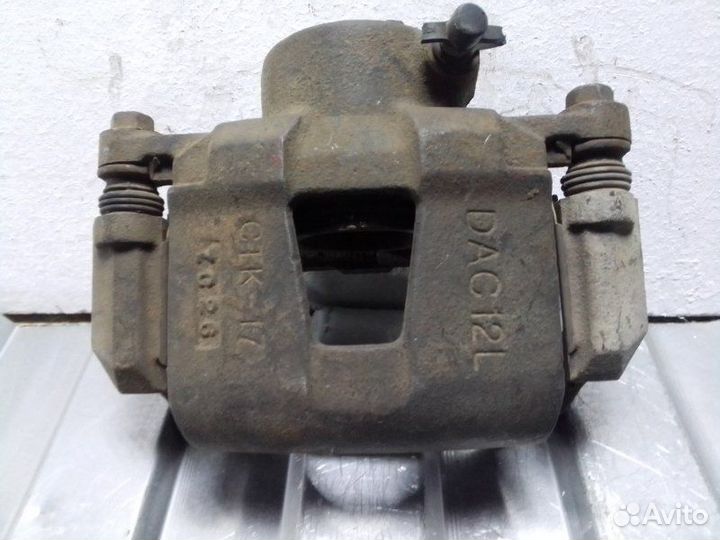 Суппорт передний передний левый Opel Astra J