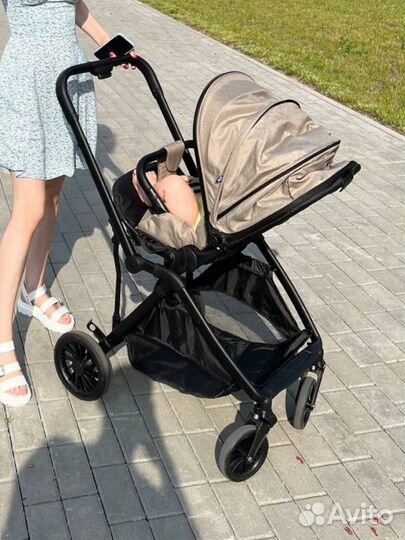 Прогулочная коляска с реверсивным блоком