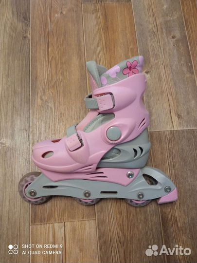 Роликовые коньки