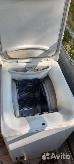 Стиральная машина с вертикальной загрузкой